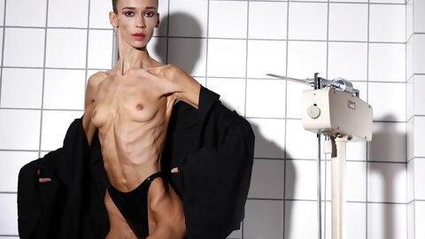 Skinny Brunette With Hairy Pussy Spreads...