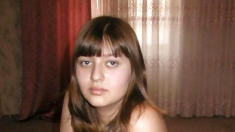Sexy Teen Putting On Tan Tights D10